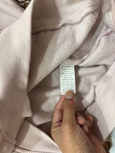 Pink Hooded Sweatshirt with Floral Detail