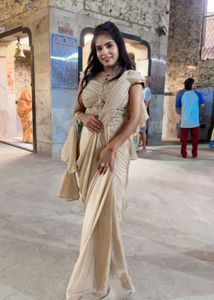 Elegant Cream Saree with Embellished Blouse