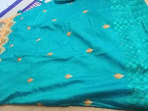 Stunning Teal Silk Saree with Gold Embroidery