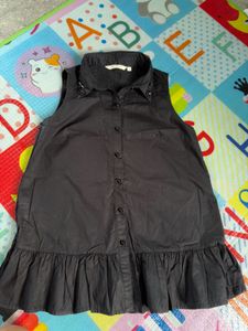 Chic Black Sleeveless Ruffled Tunic Top