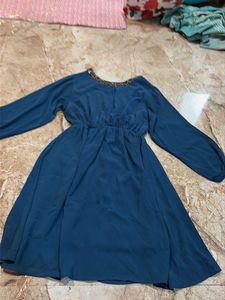 Elegant Teal Dress with Embellished Neckline