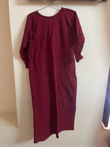 a deep marron colour kurta set