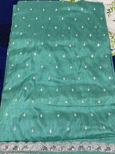 Elegant Teal Saree with Silver Border