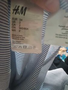 Blue and White Striped Sleeveless Shirt