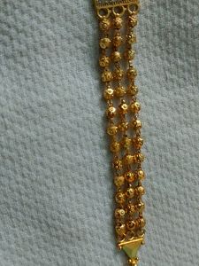 Elegant Gold and Pink Stone Bracelet