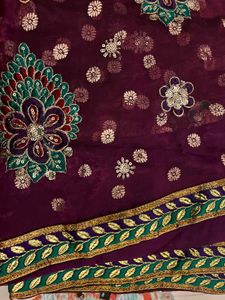 Embroidered Purple Net Saree