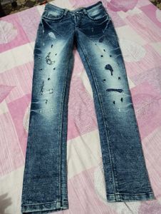 Distressed Blue Denim Jeans