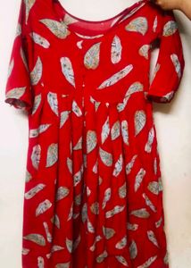 girls red frock + gift