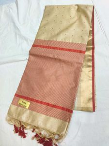 Elegant Beige Saree with Red Dots