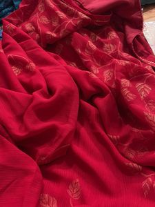 Elegant Pink Saree with Golden Leaf Print