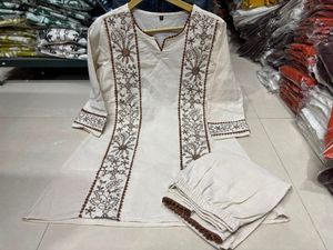 Elegant Beige Embroidered Kurta Set