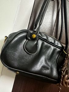 Chic Black Handbag with Charms