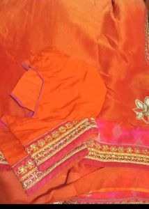 Vibrant Orange Saree with Pink Border