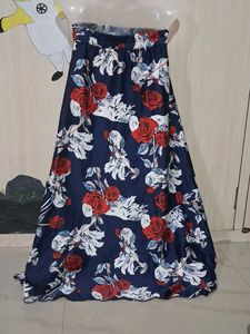 Flowy Floral Maxi Skirt waist is elastic.