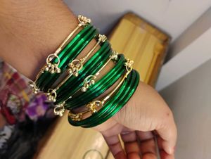 Green Glass Bangles with Gold Charms