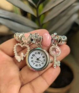 Charming Rose Gold Charm Bracelet Watch