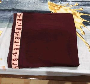 Maroon saree with Embroidered Border