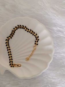 Gold and Black Herringbone Bracelet