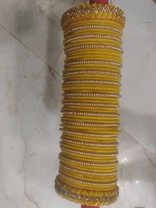 Vibrant Yellow Bangle Set with Gold Embellishments