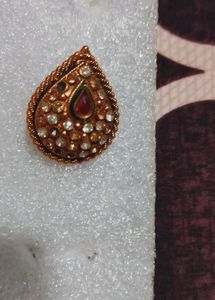 golden drop shape ring