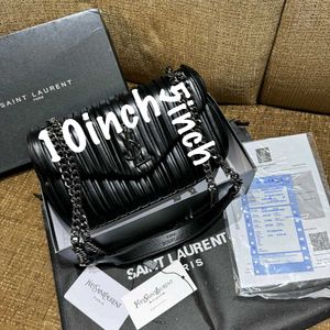 YSLsleek black shoulder bag features striking vert