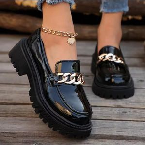 Chic Black Loafers with Gold Buckle