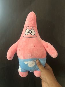 pink Patrick Star plush toy wearing his signature