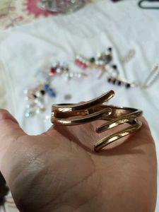Unique Gold Tone C-Shaped Bracelet