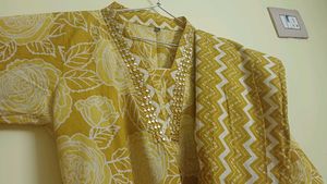Yellow Floral Kurta Set with Embellished Neckline