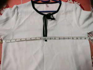 Elegant White Blouse with Black Trim