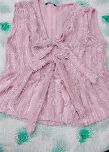 Chic Pink Peplum Top with Bow Detail
