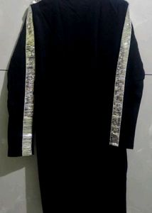 Black long sleeve mini dress with sequined sleeves