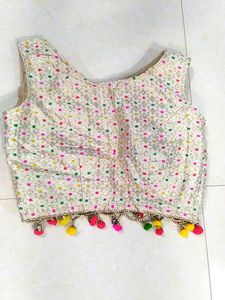 A Multi Colour Blouse , White Skirt