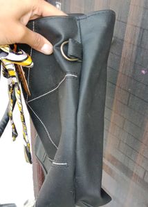 Stylish Black Shoulder Bag with Scarf Accent