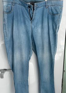 Light Wash Denim Jeans with Zipper Detailing