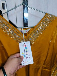party wear 3 suits Yellow Embroidered Kurta