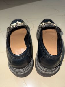 Chic Black Loafers with Gold Bit Detail