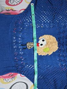 Chic Blue Crochet Knit Top with Doll Applique