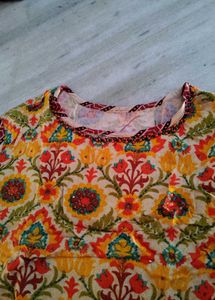 Vibrant Floral Print Sleeveless Kurta