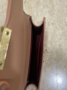 beige sling bag
