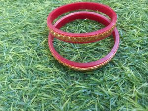 Elegant Gold Bangles with Stone Embellishments