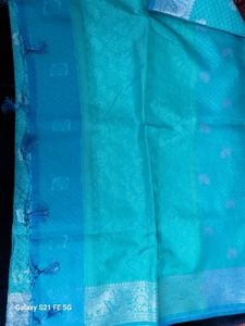 Elegant Teal Saree with Silver Weave