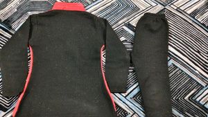 Stylish Red Knit Sweater with Embellishments