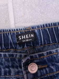 Distressed Wide-Leg Jeans