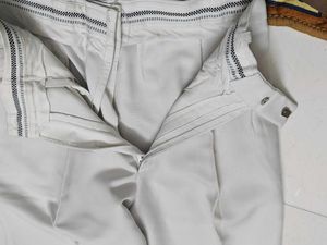 Classic Beige Pleated Trousers