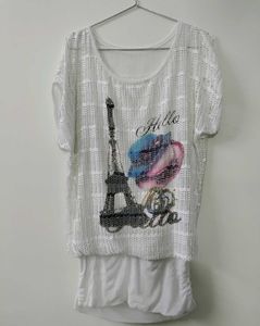 Eiffel Tower Graphic Top with Shiny Earrings.