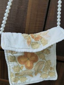 Embroidered Clutch Bag with Pearl Strap