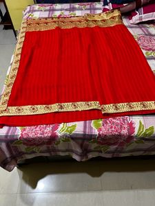Elegant Red Saree with Golden Border