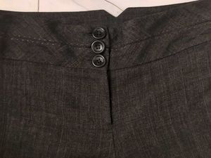 flared brown trousers/ pants