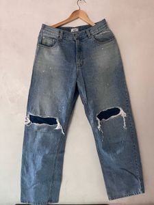 Distressed Blue Denim Jeans